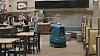 Gulvvaskerobot i restaurantmiljø