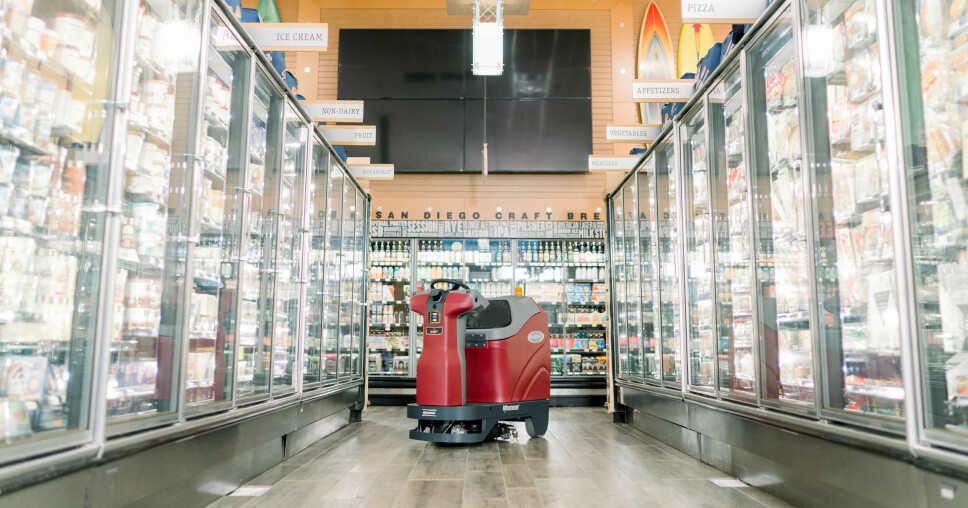 Ill.foto som viser roboten Minuteman Roboscrub 20 i dagligvarehandel. Denne har 'innmat' fra Brain Corp.